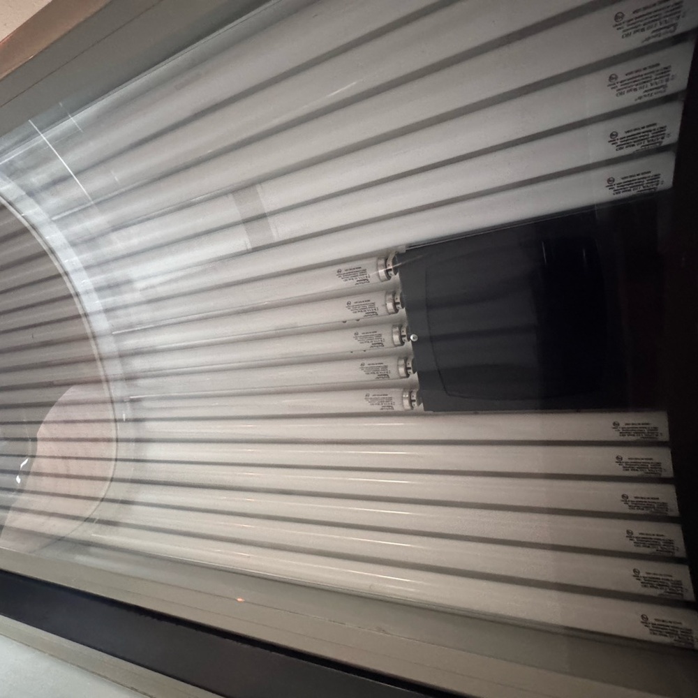 Tanning Bed with Black Control Panel